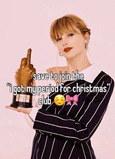 a woman holding a trophy with the words save to join the i got my period for christmas