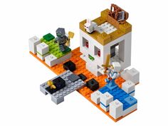 a lego set is shown with an orange floor and white walls, including a kitchen