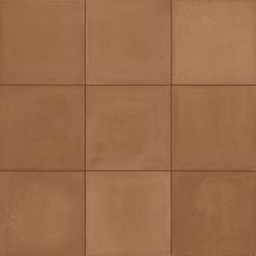 a brown tile wall with squares in it