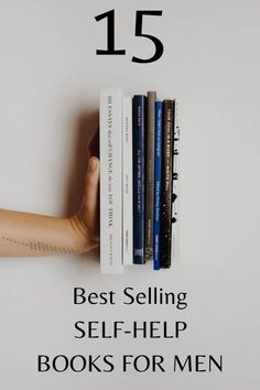 a person's hand holding books with the text best selling self help books for men