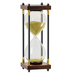 an hourglass with sand running through it on a wooden stand against a white background