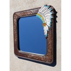 This Indian Chief Headdress Wall Mirror is made of polyresin and glass, hand painted and polished individually. Bungalow Rose | Bungalow Rose Ozdemir Wall Decor 20.25 H x 20.0 W x 1.0 D in / white in Brown | 20.25" H X 20" W | Wayfair | Home Decor Indian Chief Headdress, Chief Headdress, Contemporary Rustic Decor, Chiefs Headdress, Wicker Wall Decor, Wicker Wall, Cross Wall Decor, Leather Wall, Nature Wall Decor