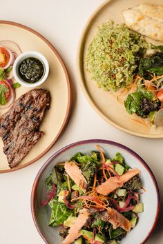 two plates filled with different types of food