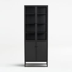 a tall black bookcase with glass doors on the front and bottom shelves, against a white background