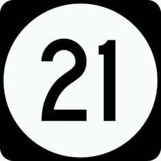 a black and white circle with the number 21 on it