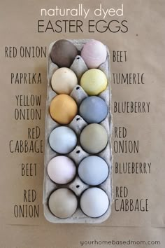 an egg carton filled with different colored eggs