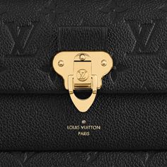 The vavin wallet on chain is fashioned from monogram empreinte leather and finished with a gold-color lock inspired by louis vuitton trunks. This model in leather’s subtle tone-on-tone embossed print complements the wallet on chain classic lines perfectly. The front pocket, embossed with the louis vuitton signature, fits a phone, while inside pockets and compartments bring convenience. Louis Vuitton Checkbook Wallet, Luxury Travel Wallet With Chain Strap, Luxury Gold Wallet On Chain With Branded Hardware, Luxury Gold Wallet On Chain For Business, Luxury Wallets With Branded Hardware For Travel, Luxury Black Wallet On Chain With Branded Hardware, Black Luxury Wallet On Chain With Branded Hardware, Luxury Formal Wallet With Metal Logo, Luxury Travel Wallet With Branded Hardware