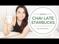 a woman sitting at a table with a cup in her hand and the words chai late starbuckss on it