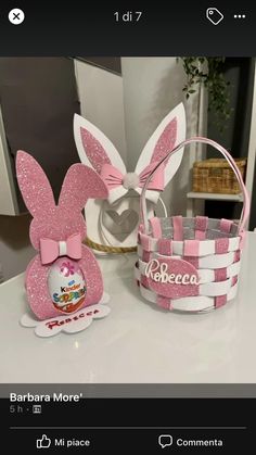 some pink and white baskets with bunny ears