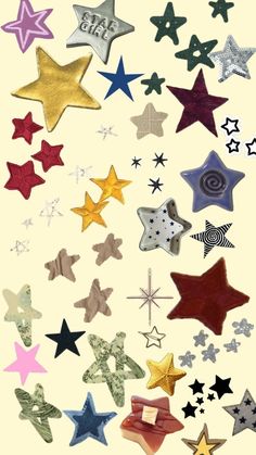 an assortment of different colored stars on a white background