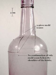 a glass bottle with information about the contents