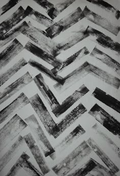 black and white photograph of an abstract chevroned pattern on a piece of paper