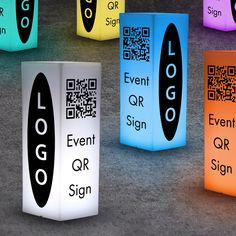 an assortment of illuminated event signs with qr code on the front and back sides