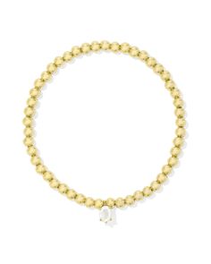 As playful as it is glam, the Cailin Gold Stretch Bracelet in Ivory Mother-of-Pearl is the style you’ll reach for time and time again. This high shine beaded bracelet gets even more sparkle with its dainty crystal charm, adding that much more wow to your wrist stack. Metal 14k Yellow Gold Over Brass Material Ivory Mother-of-Pearl Closure Stretch Bracelet Size 6.5" Unstretched Circumference, 0.36"L X 0.18"W StationDue to the one-of-a-kind nature of the medium, exact colors and patterns may vary s Gold Stretch Bracelet, Wrist Stack, Wrist Stacks, Time And Time Again, Crystal Charm, Brass Material, The Medium, Everyday Jewelry, Kendra Scott