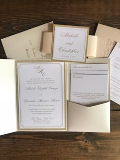 the wedding stationery is laid out on top of each other, with matching envelopes