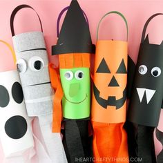 halloween crafts made out of toilet paper rolls with faces on them and bats, witches, pumpkins