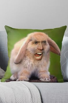 a rabbit with an angry look on its face throw pillow