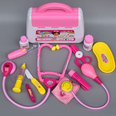 the toy doctor's kit is pink and yellow