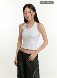 Product Detail Style : Street, Athleisure Detail : Cut out, Strap Print : Solid Material : Cotton Sleeve : Tank top Neck : Halter neck Length : Crop Cotton100 Color : Black, Light beige Model Size Model is wearing size S/M and the color Black. Height : 5'5" | 166cm / Top : S / Bottom : S (25 inch) .prddescription table, .prddescription td, .prddescription th { border : 1px solid black; border-collapse : collapse; padding: 10px; } Size(Inch) Size Shoulder Bust Armhole Hem Total Length S/M 6.3" 24 Street Athleisure, Festival Trends, Strap Tank Top, Tank Top Straps, Beige Top, Prom Outfits, Boatneck Sweater, Athleisure Fashion, Fashion Korean