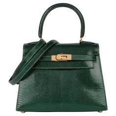 Hermès Vert Moyen Lizard Leather Vintage Kelly 20cm Sellier Brand- Hermès Model- Kelly 20cm Product Type- Shoulder, Top Handle Serial Number- [C* Age- Circa 1999 Accompanied By- Hermes Dust Bag, Shoulder Strap Colour- Vert Moyen Hardware- Gold Material(s)- Lizard Leather Height- 14cm Width- 20cm Depth- 9cm Handle Drop- 8cm Strap Drop- 46cm Interior- Green Leather Closure- Turn Lock Country of Origin- France Condition Rating- Excellent Exterior Condition- The exterior is in excellent condition wi Hermes 1999, Vintage Hermes Bag, Hermes Kelly 25, Kelly 25, Vintage Kelly, Bag Outfit, Kelly Bag, Vintage Hermes, Jane Birkin