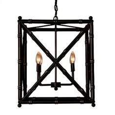 a chandelier with two lights hanging from it's center and bamboo frame