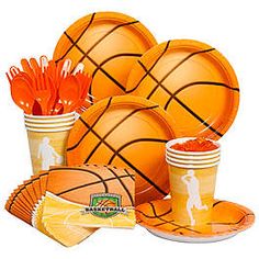 an orange basketball themed tableware set with cups and utensils