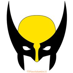 a yellow and black mask with horns on it