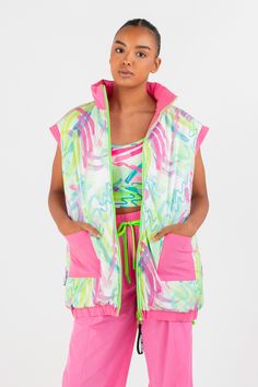 Glow with confidence in this season’s hottest fashion piece—the Highlighter Sleeveless Puffer Jacket in Flower Pink. This is the new street style essential. Created with you in mind, this piece is reversible—barbie core pink on the front and our abstract watercolor print on the reverse side. Two wears in one, what more can you ask? Sporty Green Vest For Spring, Summer Sleeveless Outerwear For Streetwear, Sleeveless Summer Outerwear For Streetwear, Sleeveless Outerwear For Summer Streetwear, Pink Nylon Outerwear For Spring, Trendy Nylon Spring Vest, Trendy Nylon Vest For Spring, Trendy Spring Nylon Vest, Trendy Multicolor Vest For Spring