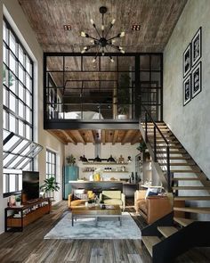 a living room filled with lots of furniture and a staircase leading up to the top floor