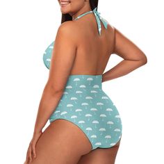 Cute Umbrella Swimsuit: Adorable vintage-inspired swimsuit with a charming blue and white umbrella pattern. Halter Blue Swimsuit: Features a deep V-neckline and a halter style top with an exposed back. One Piece Swimsuit: Made from comfortable polyester and spandex, offering a flattering fit. Tummy Control: Ruched waistline enhances your shape and provides support. Unique Retro Design: A fun and distinctive swimsuit, perfect for adding a playful touch to your summer wardrobe. Designed in Califor Retro Blue Printed Swimwear, Retro Blue Lined Swimwear, Blue Tankini For Beach Season, Blue Retro Sleeveless Swimwear, Blue Sleeveless Swimwear, Light Blue V-neck Swimwear For The Beach, Vintage Style Swimsuit, Vintage Inspired Swimsuit, Umbrella Pattern