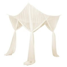 a white canopy with sheer curtains on it