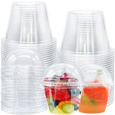 plastic cups with lids are stacked on top of each other and filled with different types of fruit