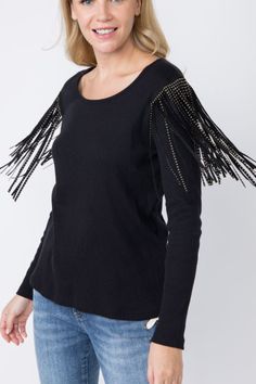 Vocal Casual ribbed long sleeve top with studded suede fringe drape on shoulders. Boho, festival, basic. Stunning detail. Color: Black Sizes: S-M-L-XLBust flat 32-34-36-38, fabric is stretchy, Length 25 100% Cotton, Made in USA X/18570L Chic Long Sleeve Fringe Tops, Fringe Tops For Fall Party, Chic Fringe Tops For Fall, Chic Long Sleeve Tops With Fringe, Fitted Tassel Tops For Fall, Fall Party Tops With Fringe, Chic Spring Top With Rhinestone Fringe, Fall Party Tops With Fringe Details, Winter Long Sleeve Tops With Tassels