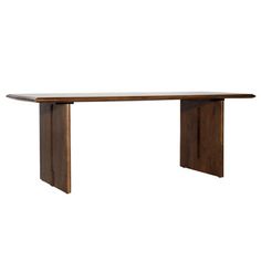 a wooden table sitting on top of a white floor