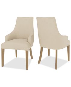 two beige chairs sitting next to each other