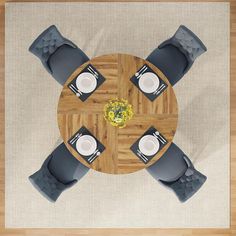 an overhead view of a wooden table with grey chairs