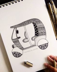 a drawing of a car is shown in black and white, with markers next to it