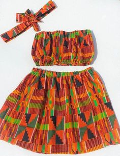 Fitted Multicolor Sets With Tiered Skirt, Fitted Multicolor Skirt Set For Summer, Multicolor Fitted Skirt Set For Summer, Green Tiered Skirt Set With Fitted Top, Green Fitted Tiered Skirt Set, Green Fitted Sets With Tiered Skirt, Fitted Orange Bohemian Sets, Fitted Cotton Skirt Set For Summer, Fitted Matching Sets For Summer