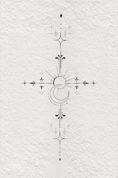 the cross is drawn in black ink on white paper with an intricate design and decorative elements