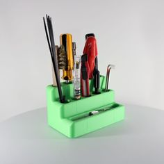 3D printed organizer for storing tools by slimprint Pen Holder With Plastic Bottle, Pen Stand From Waste Materials, Multicolor Rectangular Organizer With Pen Slots, Multicolor Pencil-shaped Case With Pen Holders, Pencil-shaped Pen Holder For Personal Use, Knife Block