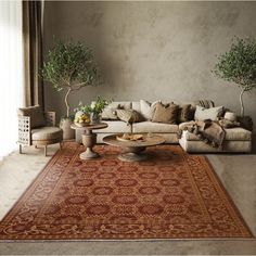 a living room with couches, tables and potted plants on the rugs