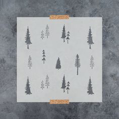 a piece of paper with trees on it