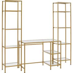 three gold metal shelvings with glass shelves