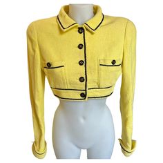 Rare and collector Chanel Spring Summer 1995 Barbie collection yellow cropped jacket, size 38 FR, fits perfectly for a size 36 FR or a true 38 FR. As seen on Claudia Schiffer for the Chanel spring 1995 add campaign photographed by Karl Lagerfeld, it’s a runway piece so collectible and the most wanted Chanel cropped jacket. It’s in good pre loved condition, light wear on the silk lining and outside some wear on the wrist and arms as you can see in the pictures. 2 pockets and CC logo buttons, 3 CC logo buttons on the wrist. This jacket is stunning, recently seen on Kim Kardashian in the sleeveless version. Bust 18.5 inches until 20 inches (stretchy fabric) Shoulders 16.5 - 17.5 inches Length 15.5 inches Chanel Spring 1995, Chanel Spring 2023, Chanel Spring Summer, 90s Top, Chanel Boutique, Chanel Spring, Claudia Schiffer, Chanel Vintage, Future Fashion