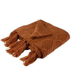 a brown knitted blanket with fringes