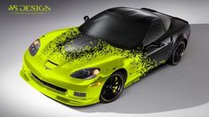 a yellow sports car with black paint splattered on it