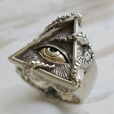 Huge Illuminati Eye Triangle Silver Unique Ring Details: - Condition: New - Metal: Copper - Band Color: Silver - Included: 1 X Ring Check Out My Other Listings! Other Items I Carry: Vintage Rings Retro Rings Men's Rings Sterling Silver Rings Engagement Bridal Wedding Rings Punk Biker Rings Ethnic Rings Floral Rings Pearl Rings Art Deco Rings Gothic Rings Couples Rings Ring Sets Heart Rings Funny Rings Silver Necklaces Gold Necklaces Vintage Necklaces And Earrings Handmade Jewelry Opal Rings Brac Masonic Rings Jewelry, The Eye Of Horus, Vintage Octopus, Ring Man, Biker Jewelry, Masonic Ring, Biker Rings, Retro Ring, Seeing Eye