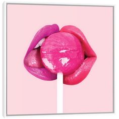 a close up of a pink lip on a stick