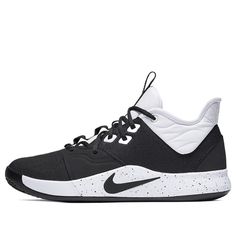 the nike basketball shoe is black and white