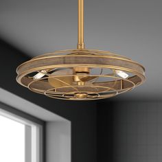 a light fixture hanging from the ceiling in a room